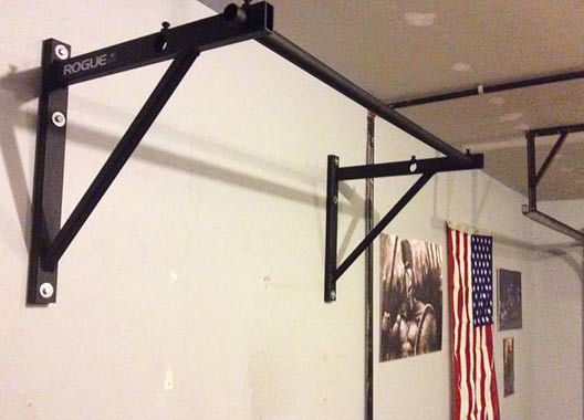 Rogue pull up bar on concrete wall